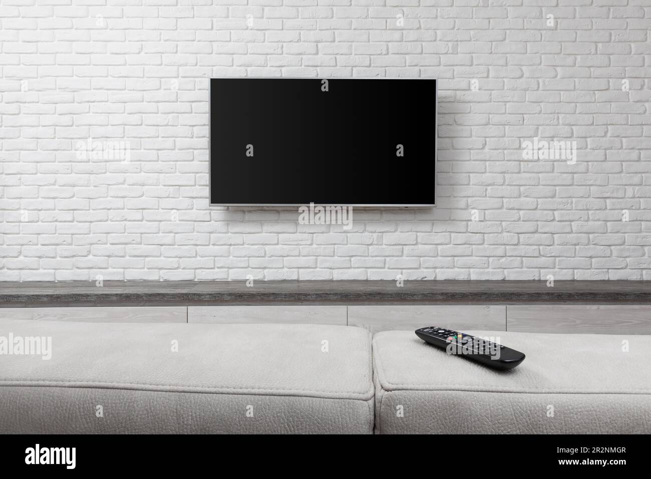 living room led tv on white wall Stock Photo - Alamy