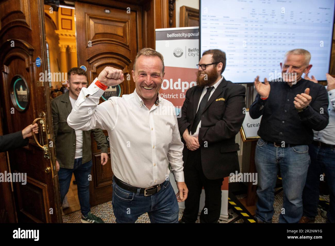 Sinn Fein’s JJ Magee (second from left) celebrates winning a seat on Oldpark at Belfast City Hall during the Northern Ireland council elections. Picture date: Saturday May 20, 2023. Stock Photo