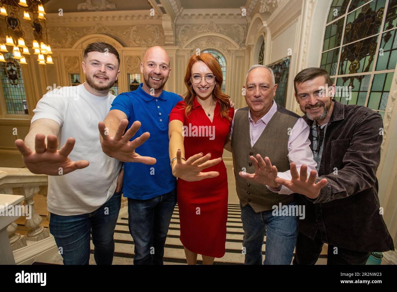 (from left) Sinn Fein’s Caoimhin McCann, Joe Duffy, Cliodhna Nic Bhranair, Seanna Walsh and Matt Garrett celebrate winning five seats in Collin at Belfast City Hall during the Northern Ireland council elections. Picture date: Saturday May 20, 2023. Stock Photo
