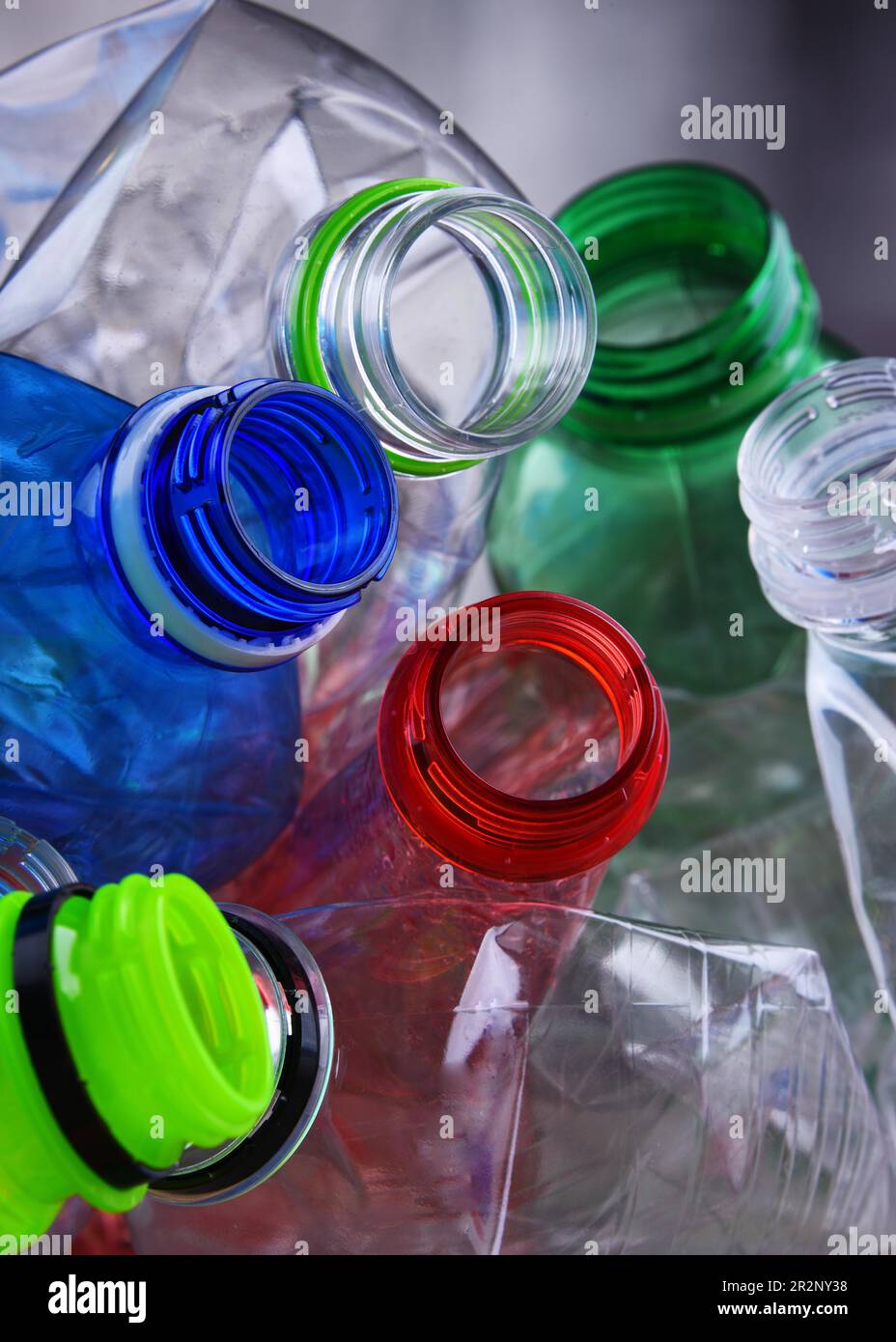 Empty colored carbonated drink bottles. Plastic waste Stock Photo
