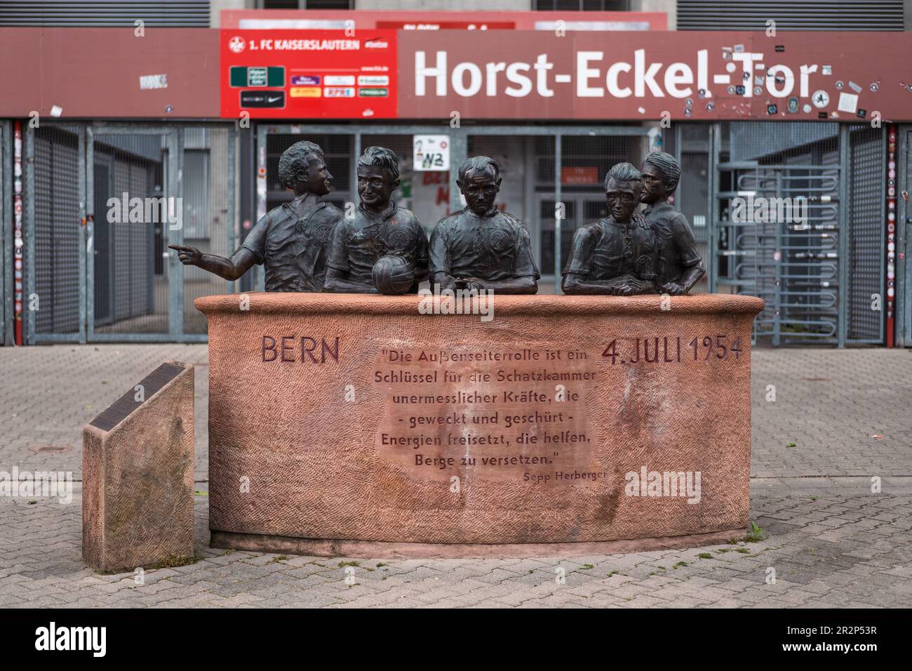 Kaiserslautern, Germany. 20th May, 2023. Football player statues in front of the Fritz-Walter stadium. Additional attraction for attendees of the Street Food Festival, on the way from, or to the event. The event takes place over two days on Saturday and Sunday. Street Food Festivals have been organized since 2014 in more than 25 cities of Germany. The idea behind is to prepare and cook international food specialities live in one place. Credit: Gustav Zygmund/Alamy News Stock Photo