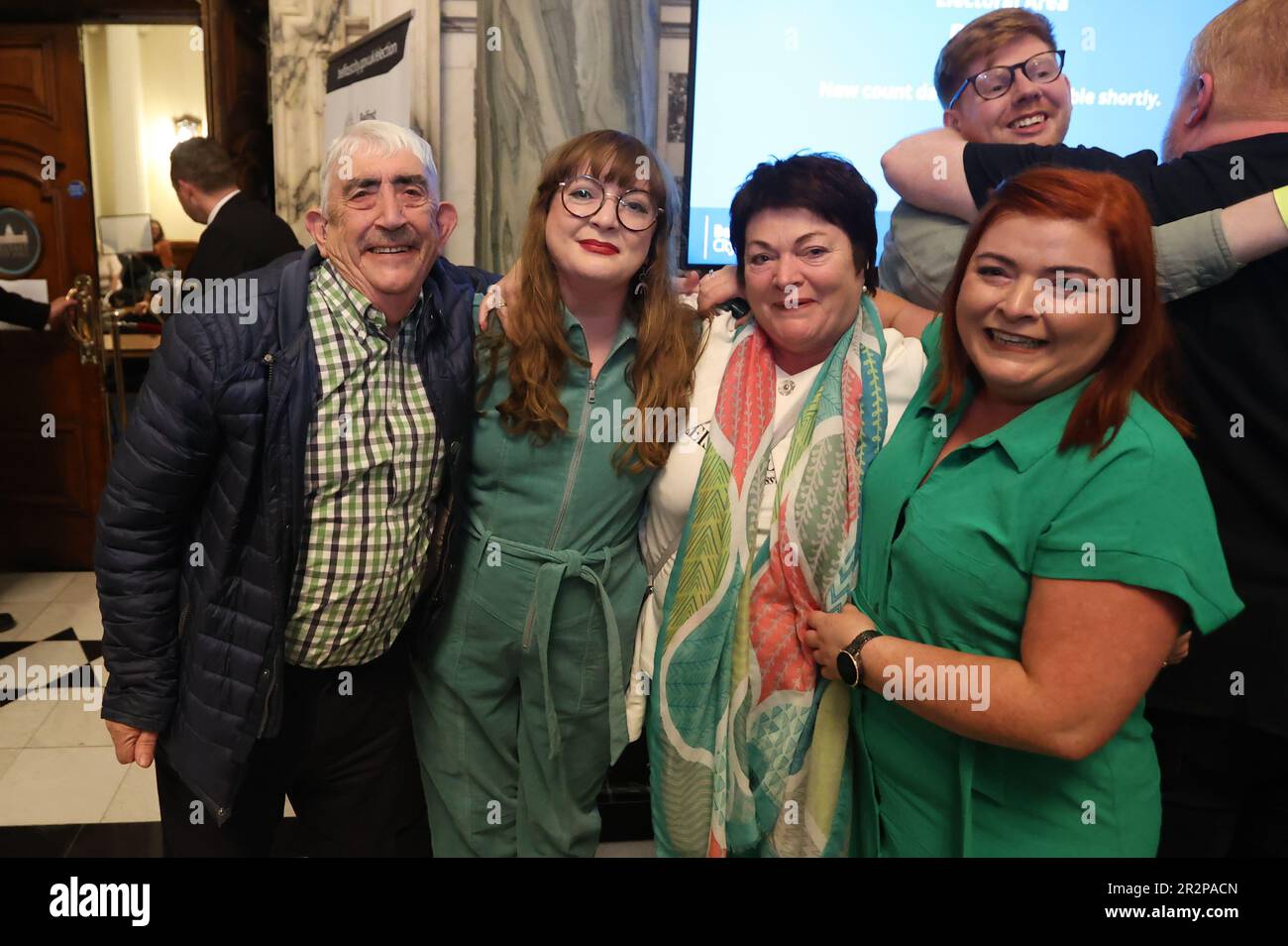 Aine Groogan from the Green Party (2nd left) with family at Belfast City Hall during the Northern Ireland council elections. Picture date: Saturday May 20, 2023. Stock Photo
