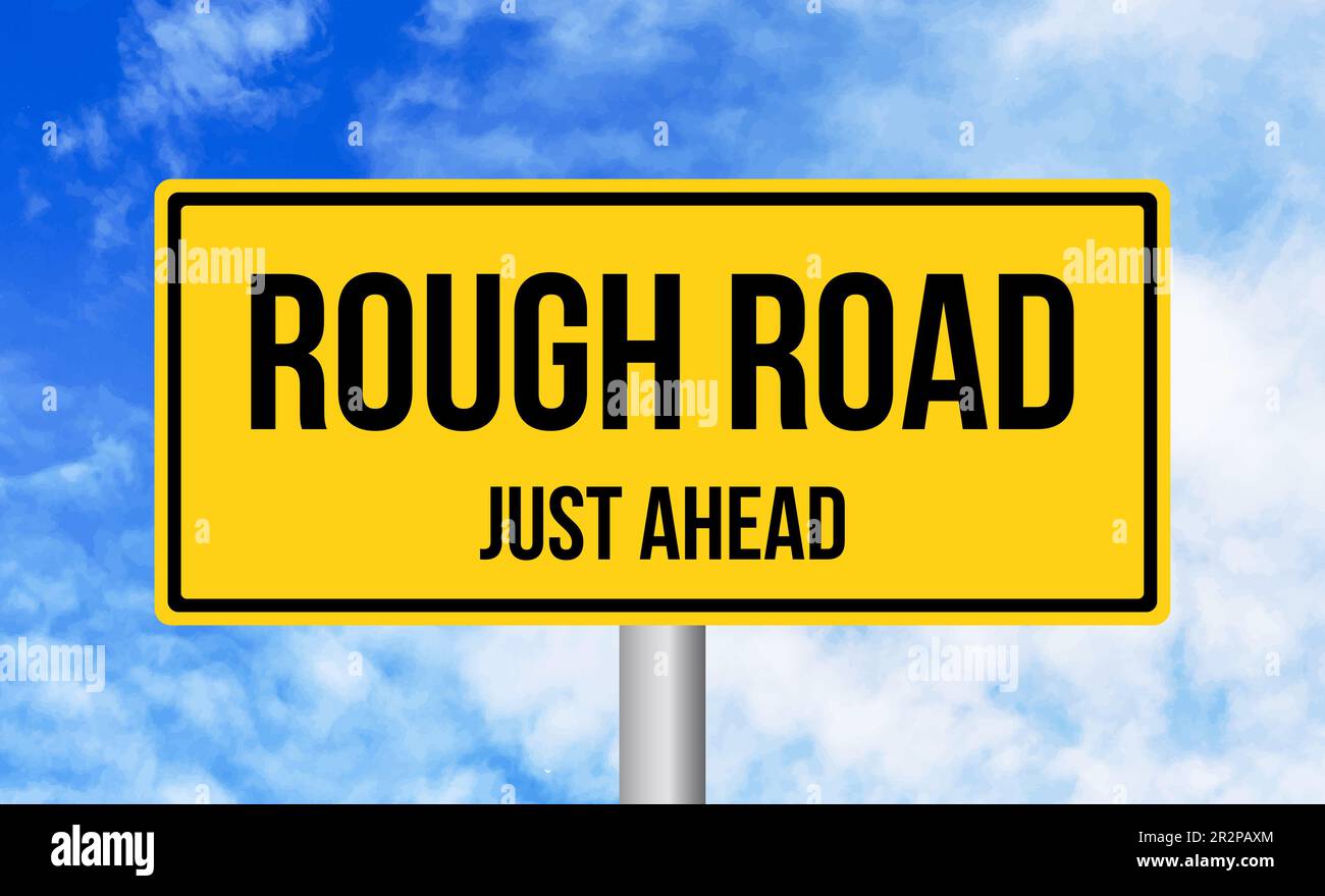 Rough Road just ahead road sign on sky background Stock Photo