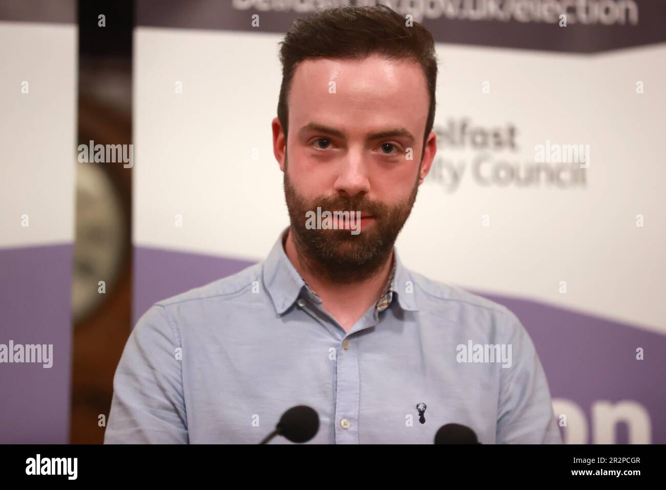Anthony Flynn from the Green Party giving an acceptance speech at Belfast City Hall during the Northern Ireland council elections. Picture date: Saturday May 20, 2023. Stock Photo