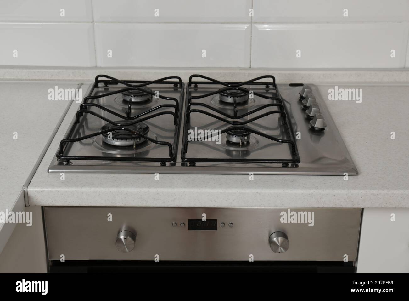 New gas stove and oven in stylish kitchen Stock Photo Alamy