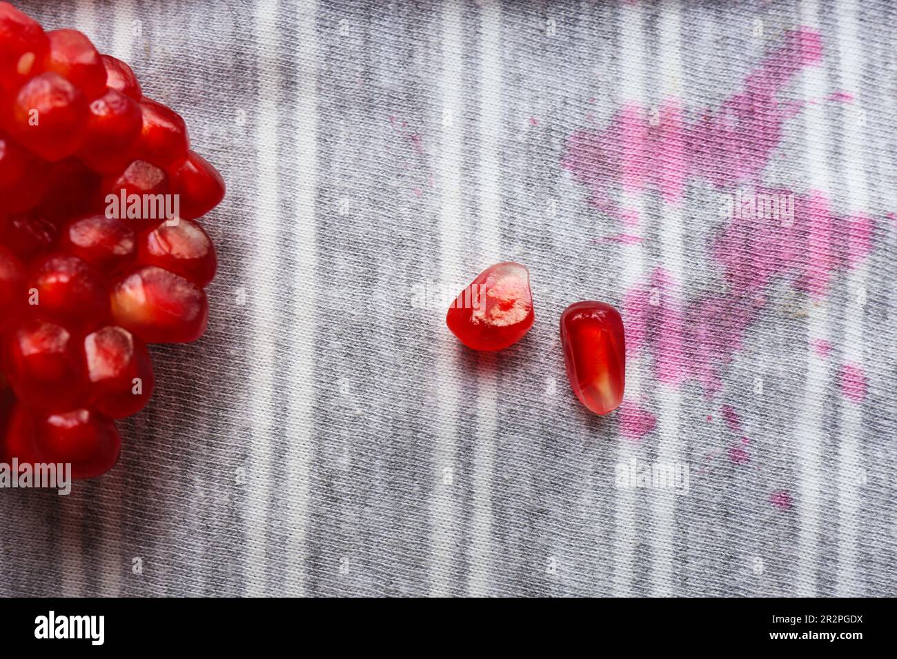 Striped shirt with fruit juicy stains