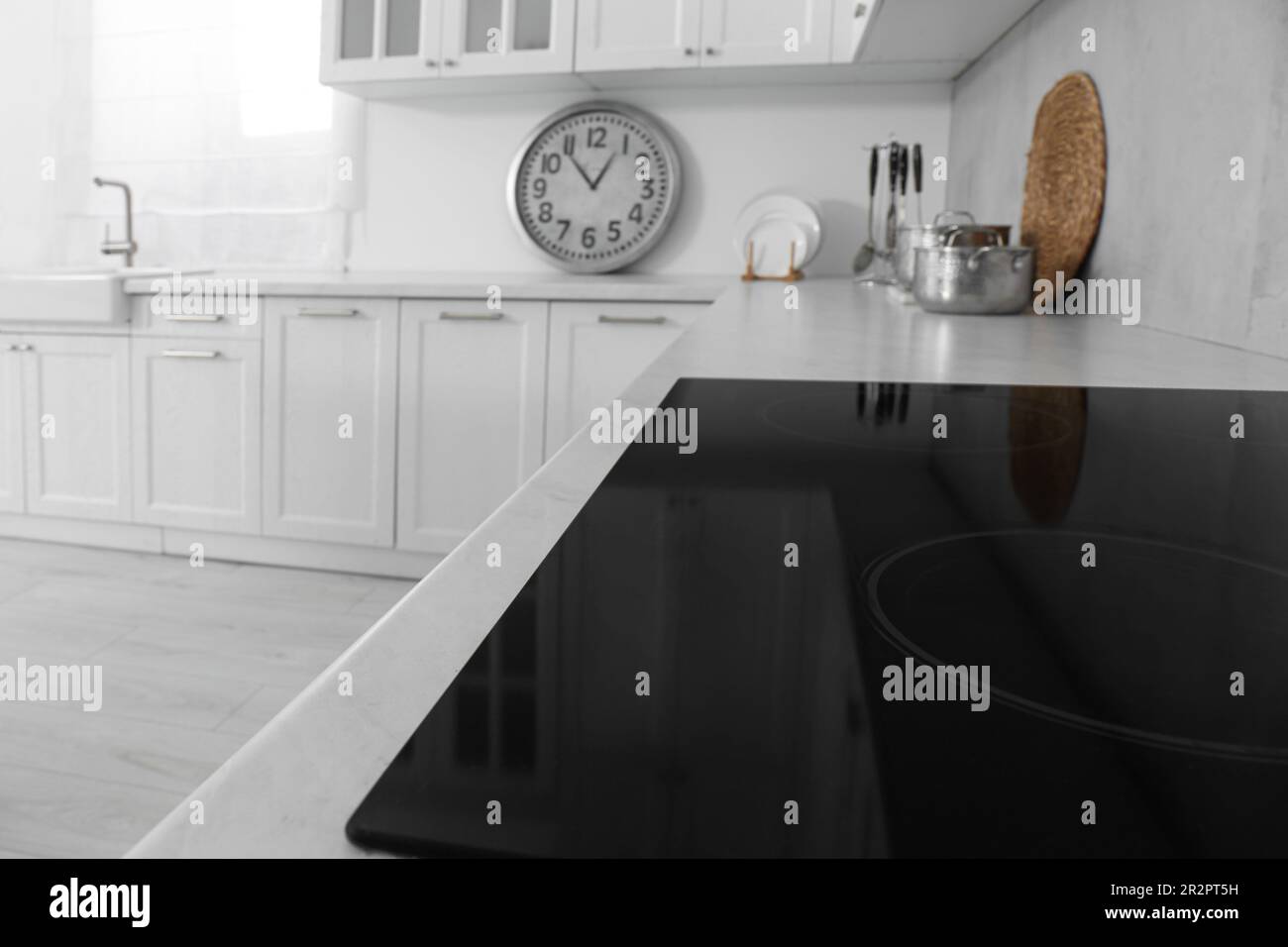 Modern inductive cooktop in kitchen. Interior design Stock Photo Alamy
