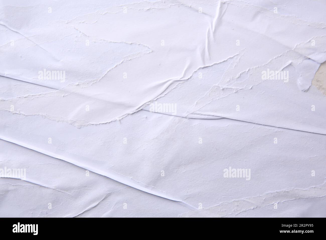 Texture of white ripped paper poster, closeup view Stock Photo - Alamy