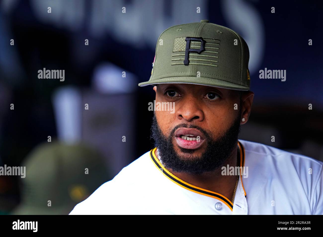 Pittsburgh Pirates' Carlos Santana walks to the dugout after striking out  during the first inning of a baseball game against the Cincinnati Reds in  Pittsburgh, Thursday, April 20, 2023. (AP Photo/Gene J.