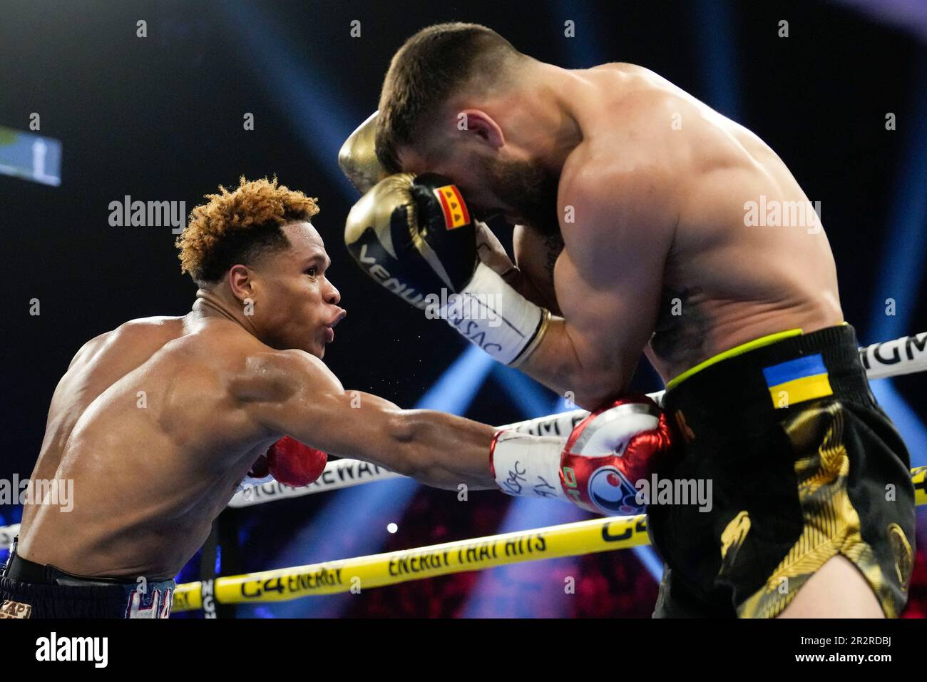 Devin Haney, left, fights Vasiliy Lomachenko in an undisputed lightweight championship boxing match Saturday, May 20, 2023, in Las Vegas