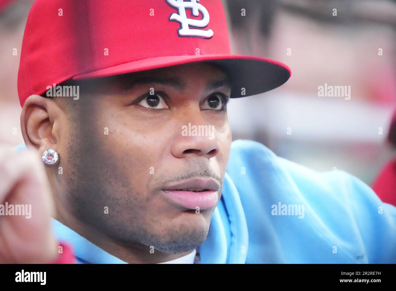 St. Louis, United States. 20th May, 2023. Rapper Nelly watches the scoreboard during the Los Angeles Dodgers-St