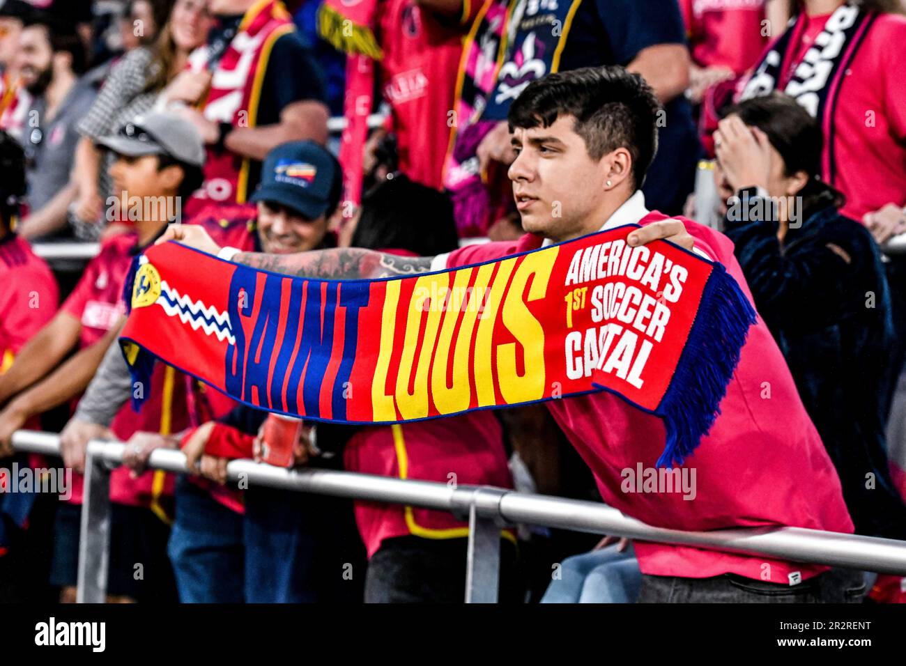 ST. LOUIS, MO - MAY 20: A fan holds up a scarf towards the Sporting Kansas  City players saying that St. Louis is America's first soccer capital during  a game between Sporting