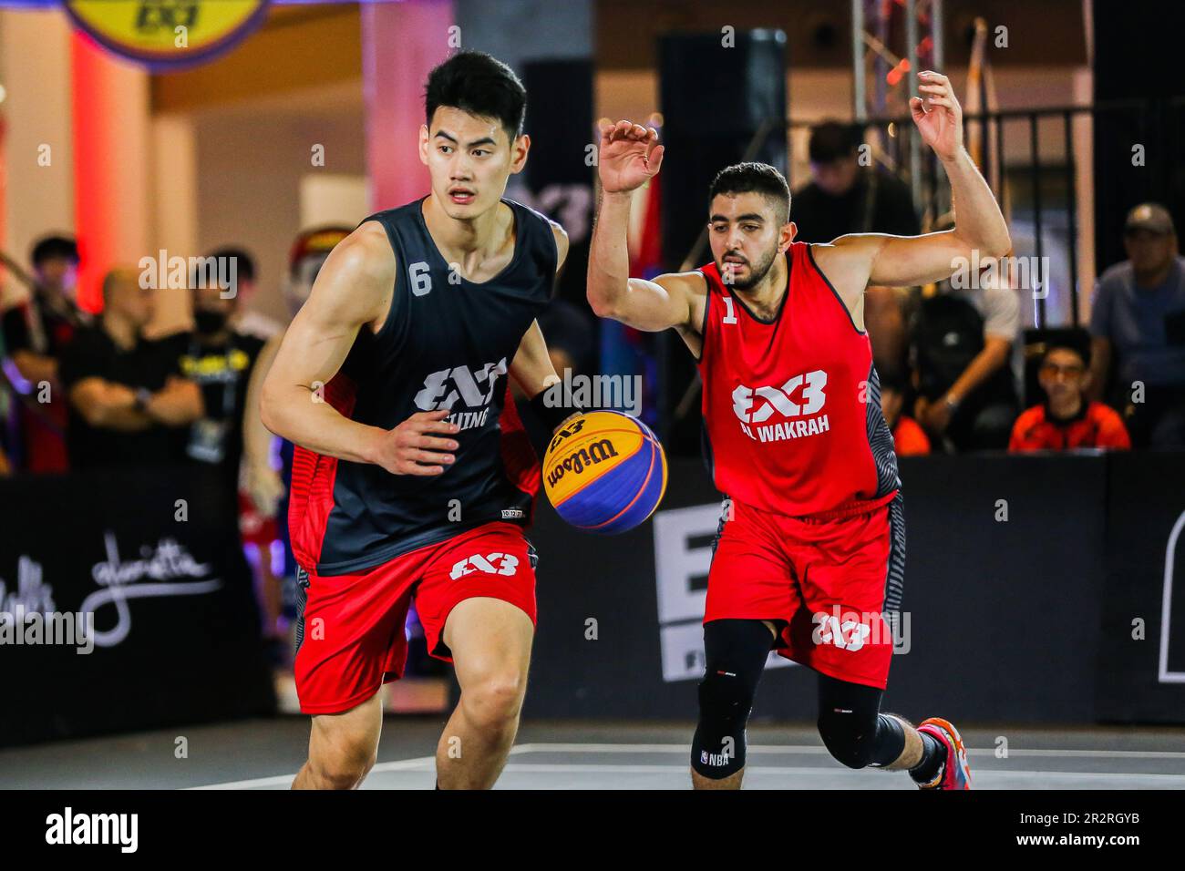 Makati City. 20th May, 2023. Yan Peng (L) of Beijing breaks through ...