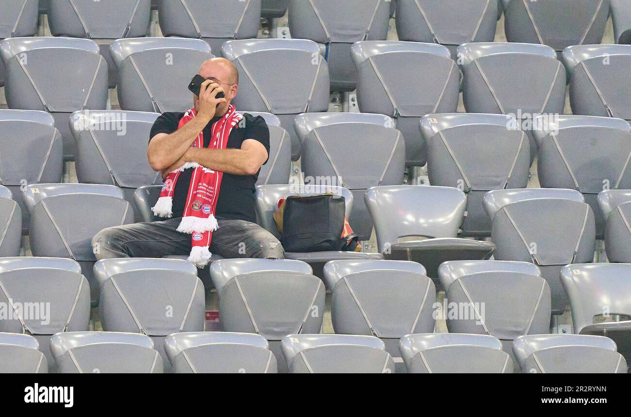 FCB Fan sad in the match FC BAYERN MUENCHEN - RB LEIPZIG 1.German Football League on May 20, 2023 in Munich, Germany. Season 2022/2023, matchday 33, 1.Bundesliga, FCB, München, 33.Spieltag. © Peter Schatz / Alamy Live News    - DFL REGULATIONS PROHIBIT ANY USE OF PHOTOGRAPHS as IMAGE SEQUENCES and/or QUASI-VIDEO - Stock Photo