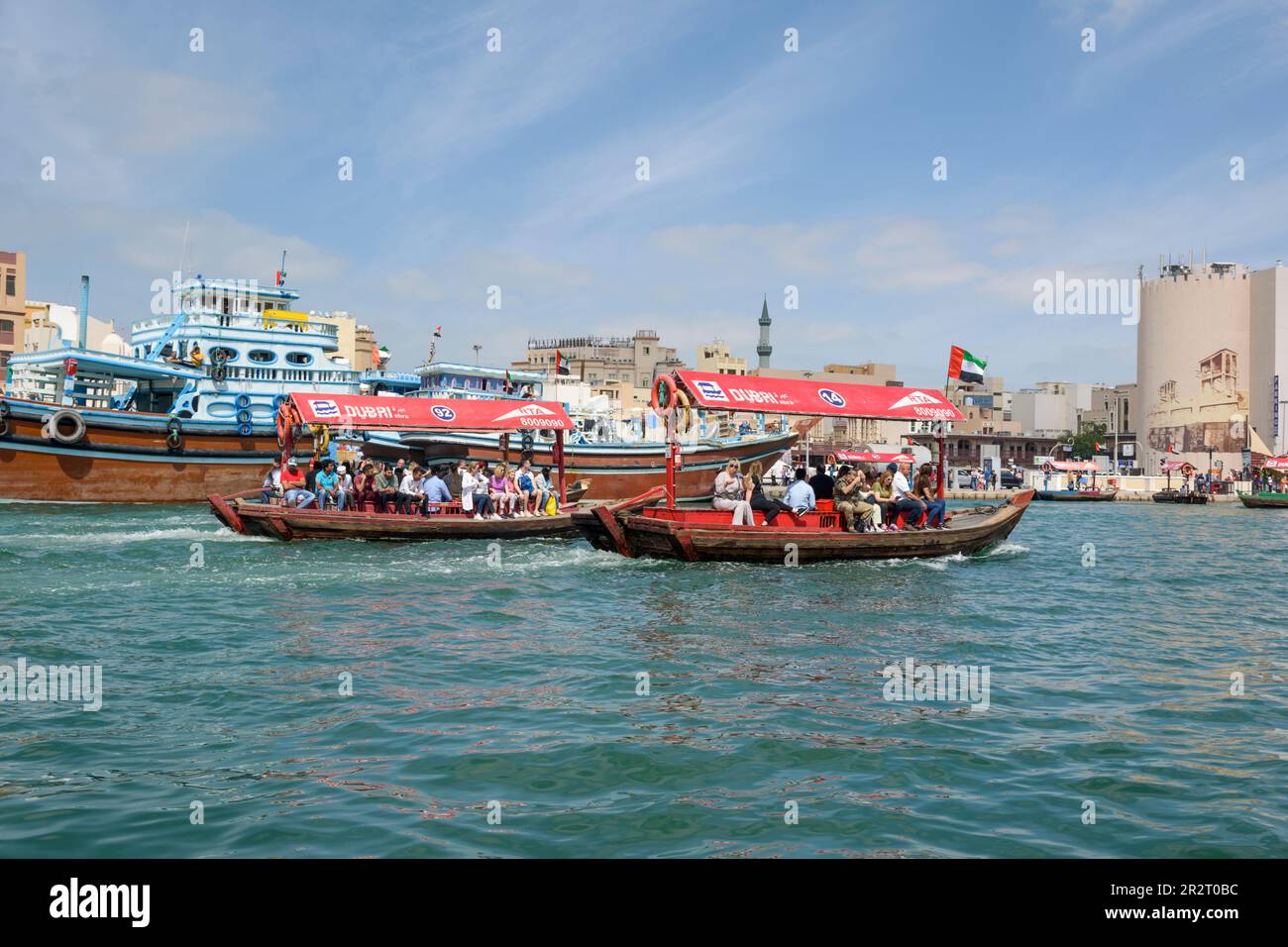 Abra ferry boats or water taxis on Khor Dubai (Dubai Creek), Dubai, United Arab Emirates Stock Photo