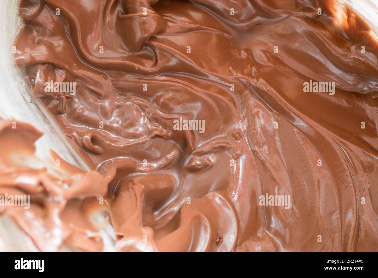 vienna, austria, 16 may 2023: chocolate spread and melted. top view, closeup and background of stock images, selective focus Stock Photo