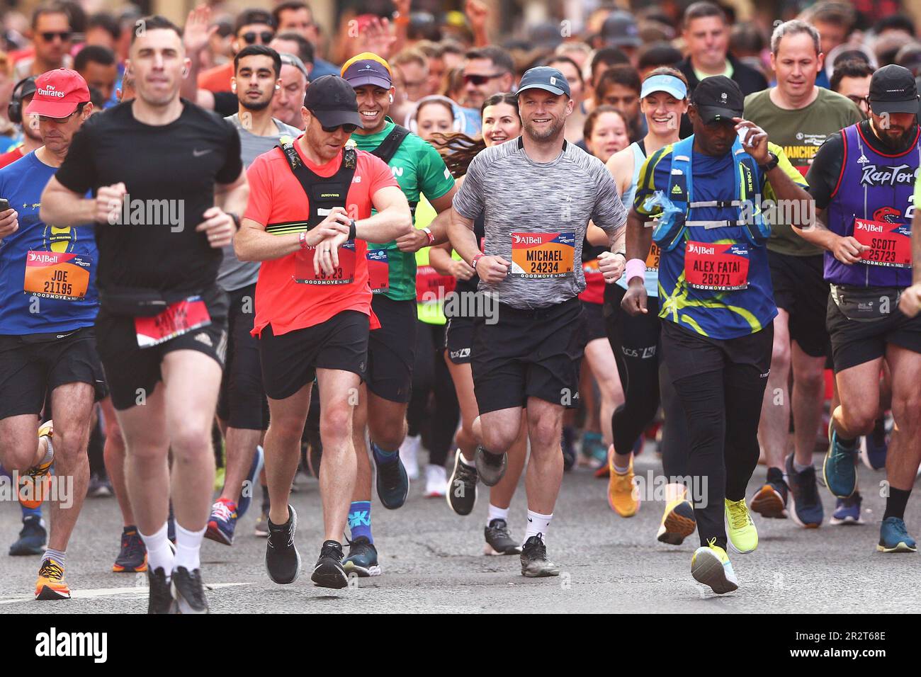 Competitors for the Half Marathon cross the start line during the AJ