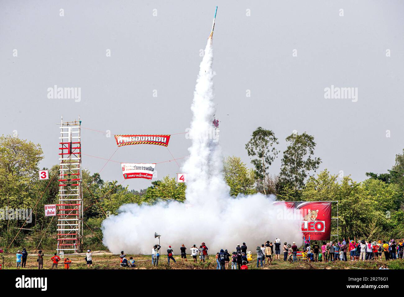 Yasothon, Thailand. 21st May, 2023. People watch a bamboo rocket
