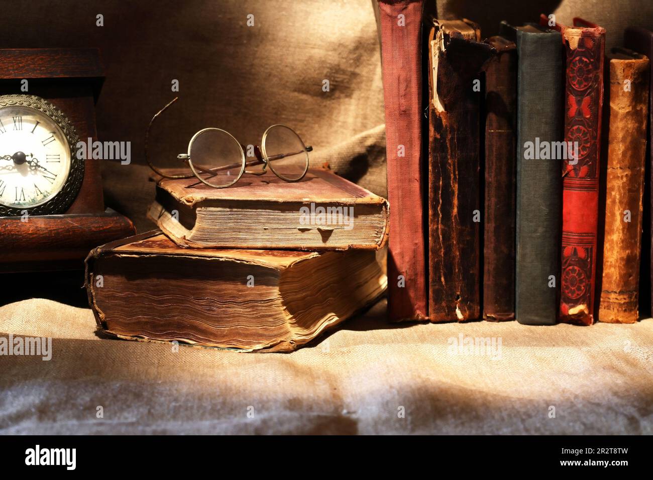 Nice vintage still life with old table clock and old books Stock Photo ...
