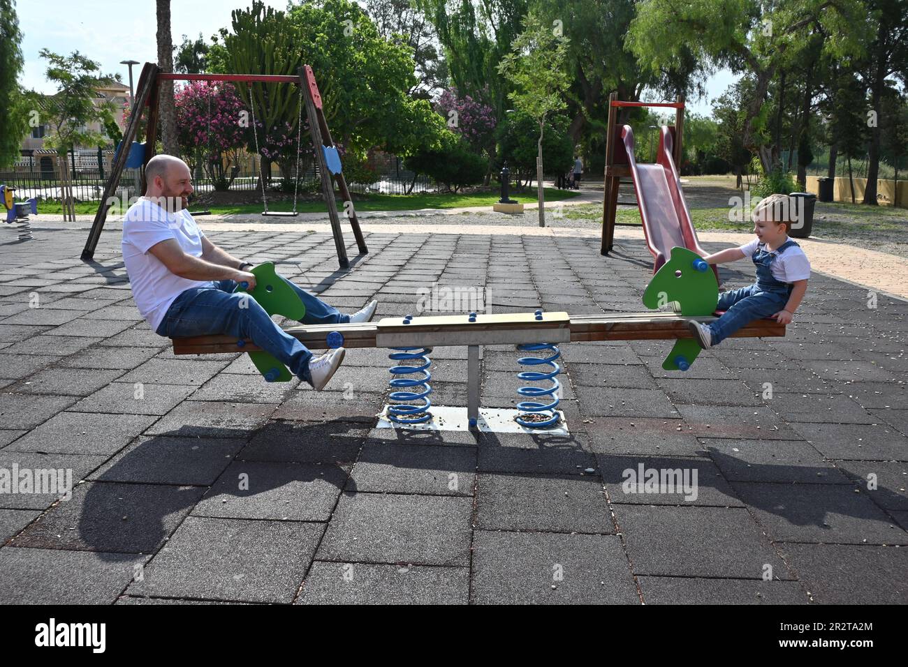 Father baby girl swing hi-res stock photography and images - Alamy