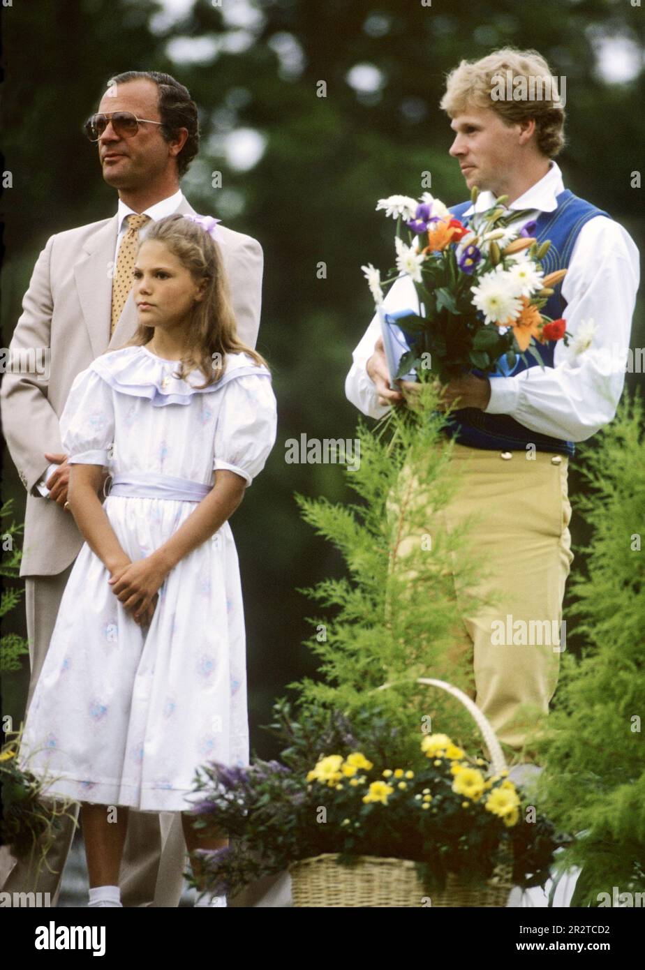 CROWN PRINCESS VICTORIA OF SWEDEN with father King Carl XVI Gustaf and Tomas Gustafsson Swedish olympic gold medalist in skating appointed Sholarship for his efforts during the Olympic winter games Stock Photo