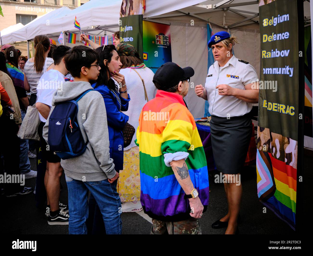Belgian Transgender policeman explaining to the public Gay Pride Brussels 2023 Stock Photo