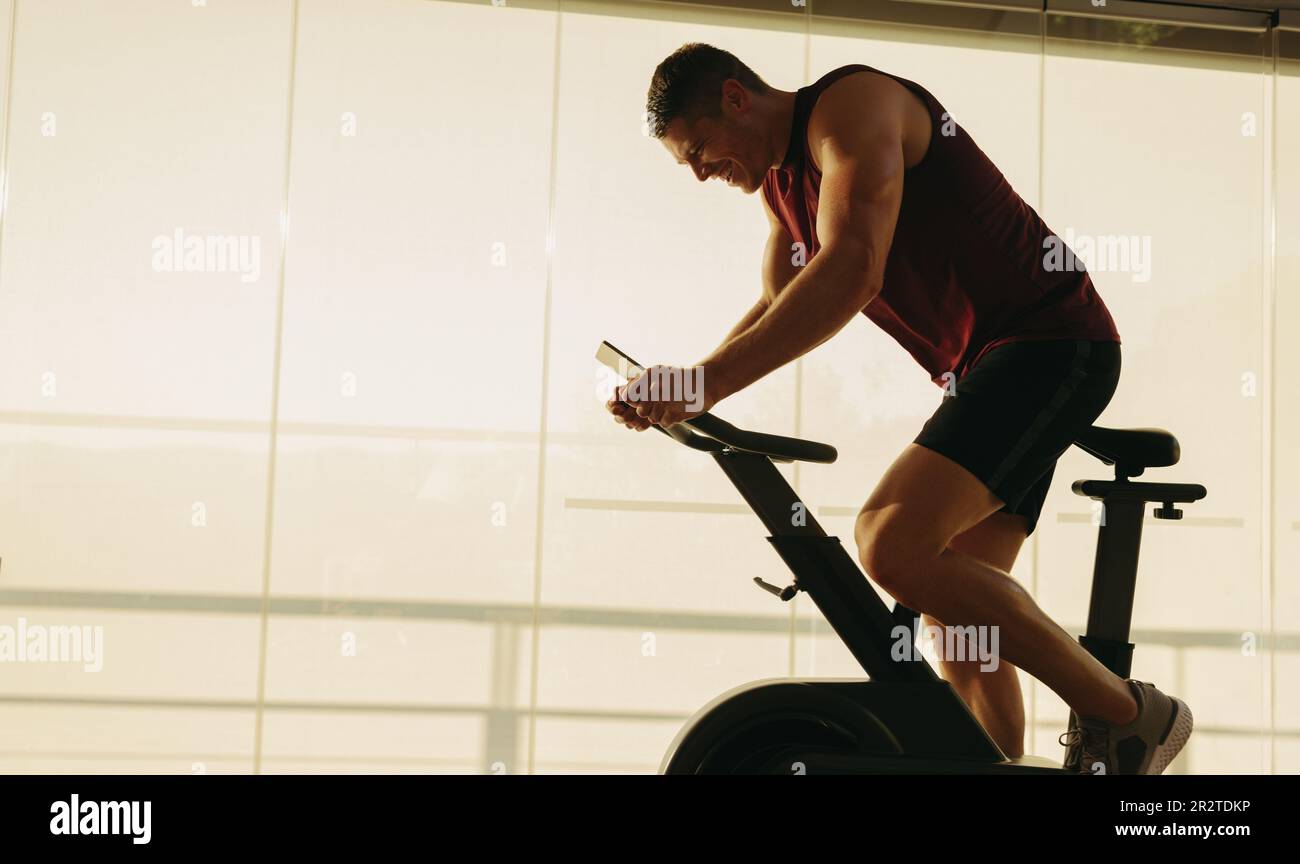 Man on exercise bike hotsell