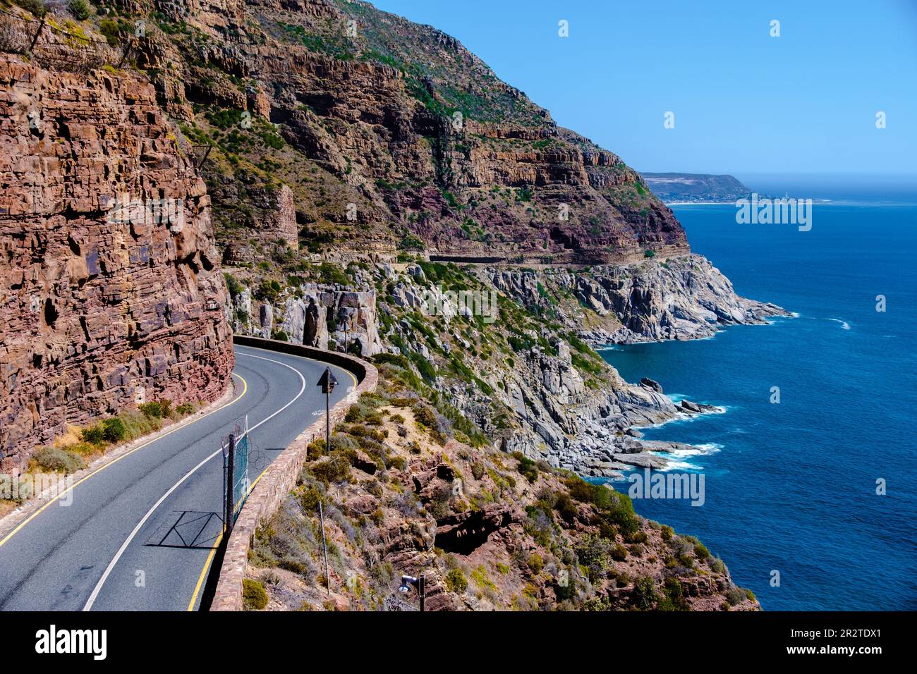 Chapman's Peak Drive on the Cape Peninsula near Cape Town in South Africa on a bright and sunny afternoon Cape Town, road trip Chapman's peak drive Stock Photo