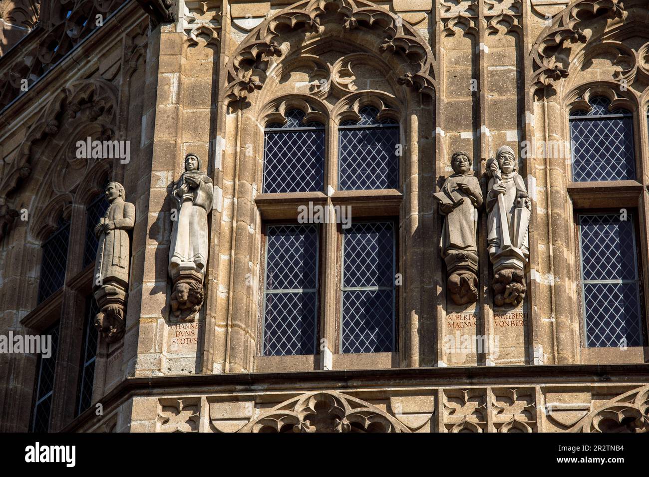 statues of important personalities at the tower of the historical town ...