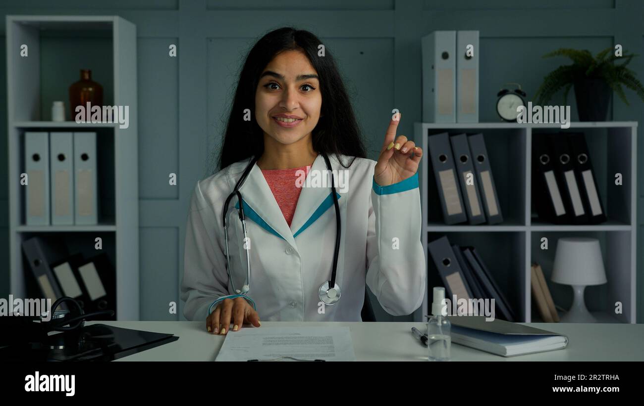 Indian doctor treating patient hi-res stock photography and images - Alamy