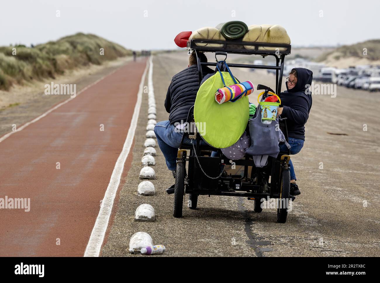 SCHARENDIJKE - Cyclists on the Brouwersdam. The North Sea side of the dam, on the border of Zeeland and South Holland, is a magnet for water sports enthusiasts. ANP ROBIN VAN LONKHUIJSEN netherlands out - belgium out Credit: ANP/Alamy Live News Stock Photo