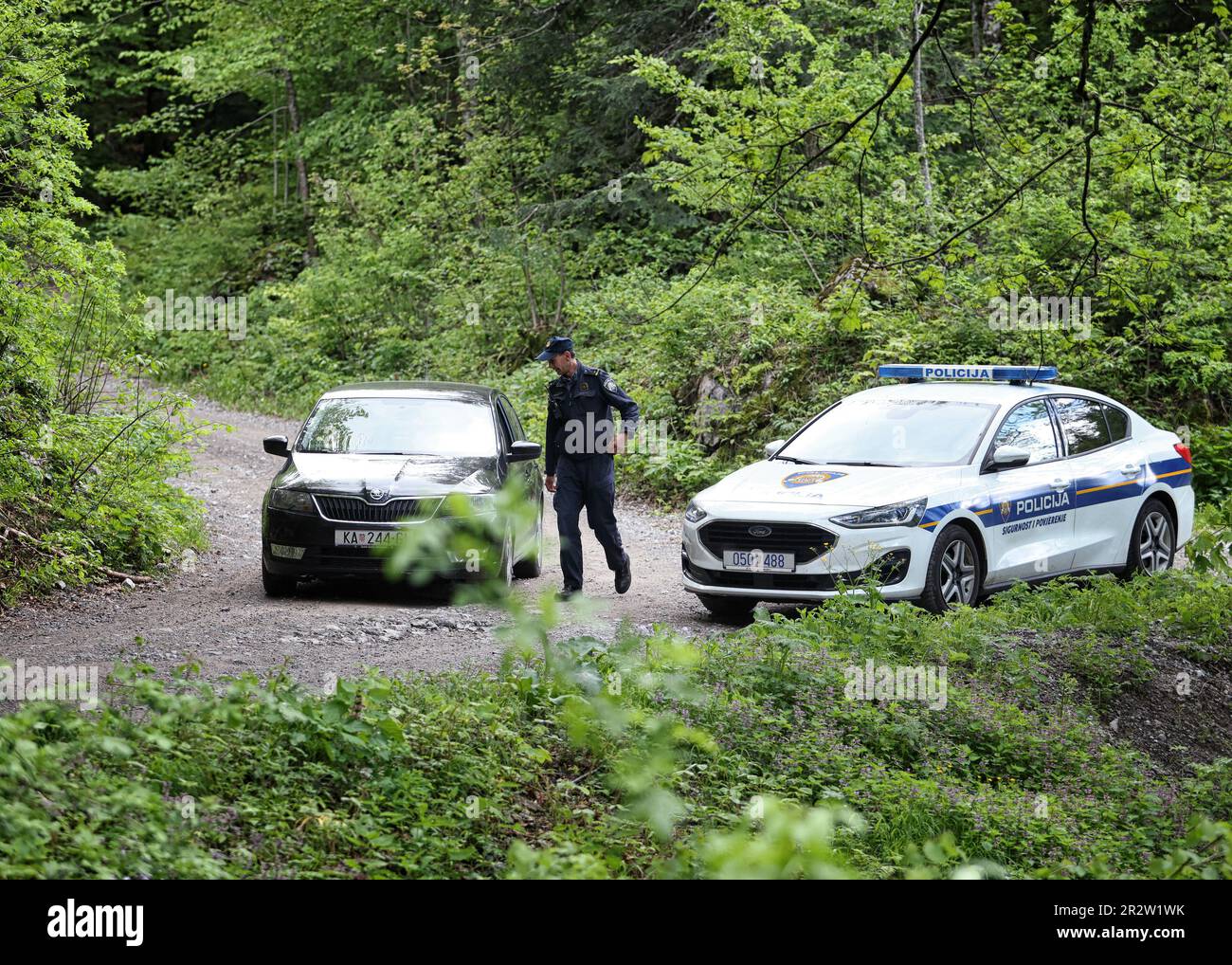 Modrus, Croatia. 21st May, 2023. Investigators leaves the crash site of ...