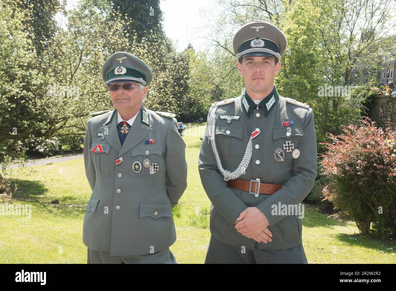 Haworth, England, UK, 21st May 2023. Haworth 1940s weekend is a popular annual event attracting people who dress in period costume. Two men dressed in german army uniforms. The Haworth 1940s weekend organisers have requested that people do not wear german Army uniforms. Credit: Paul Thompson/Alamy Live News. Stock Photo