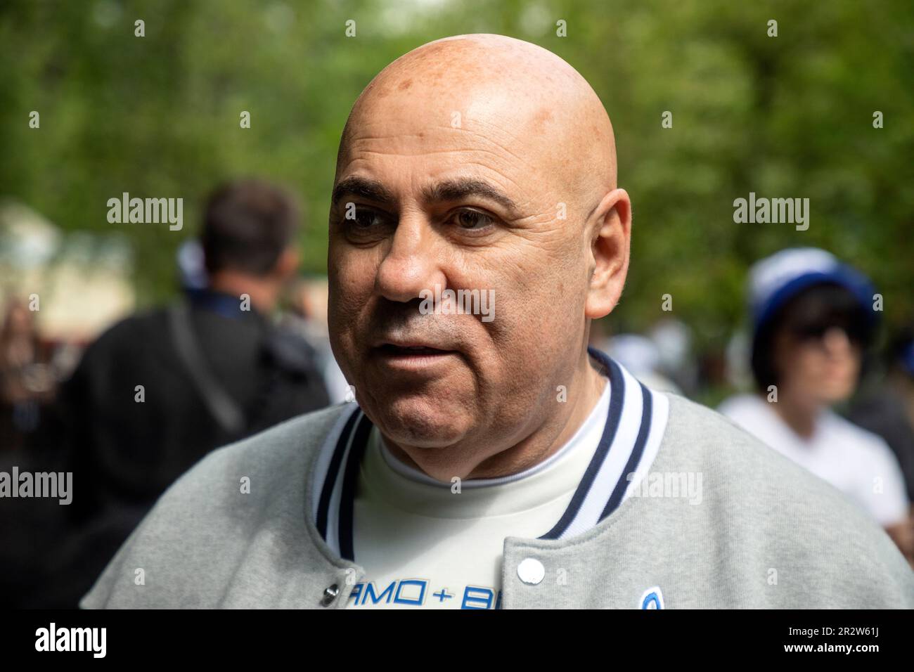 Moscow, Russia. 21st of May, 2023. Record producer Iosif Prigozhin arrives to plant out wild cherry trees in Dynamo Park to mark the Dynamo Moscow centenary as part of the Cherry Forest Festival in Moscow, Russia Stock Photo