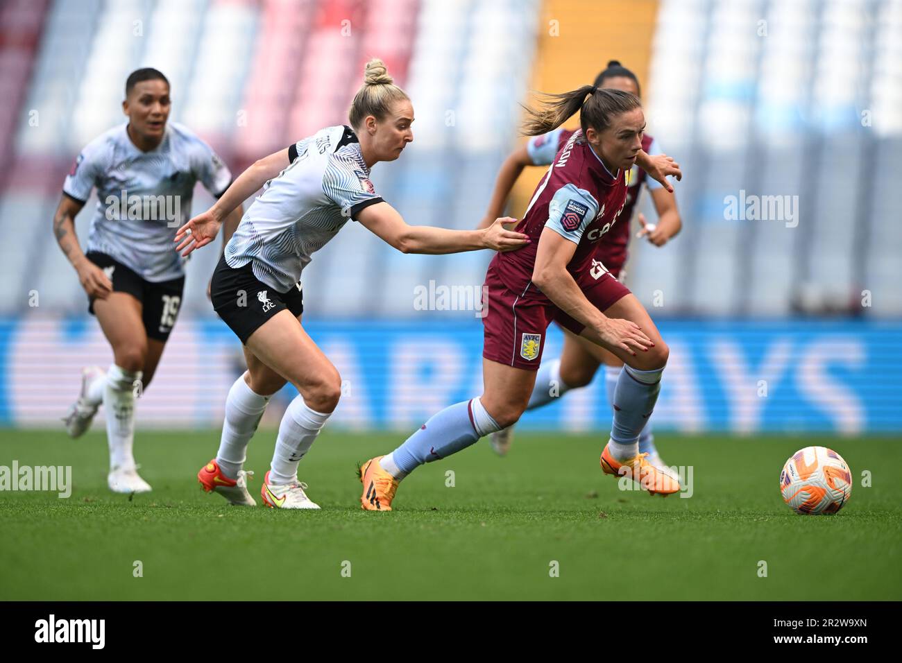 Birmingham, UK. 21st May 2023.   Kirsty Hanson of Aston Villa under pressure from Rhiannon Roberts of Liverpool during the Women’s Super League match between Aston Villa and Liverpool at Villa Park in Birmingham on 21st May 2023. This image may only be used for Editorial purposes. Editorial use only.  Credit: Ashley Crowden/Alamy Live News Stock Photo