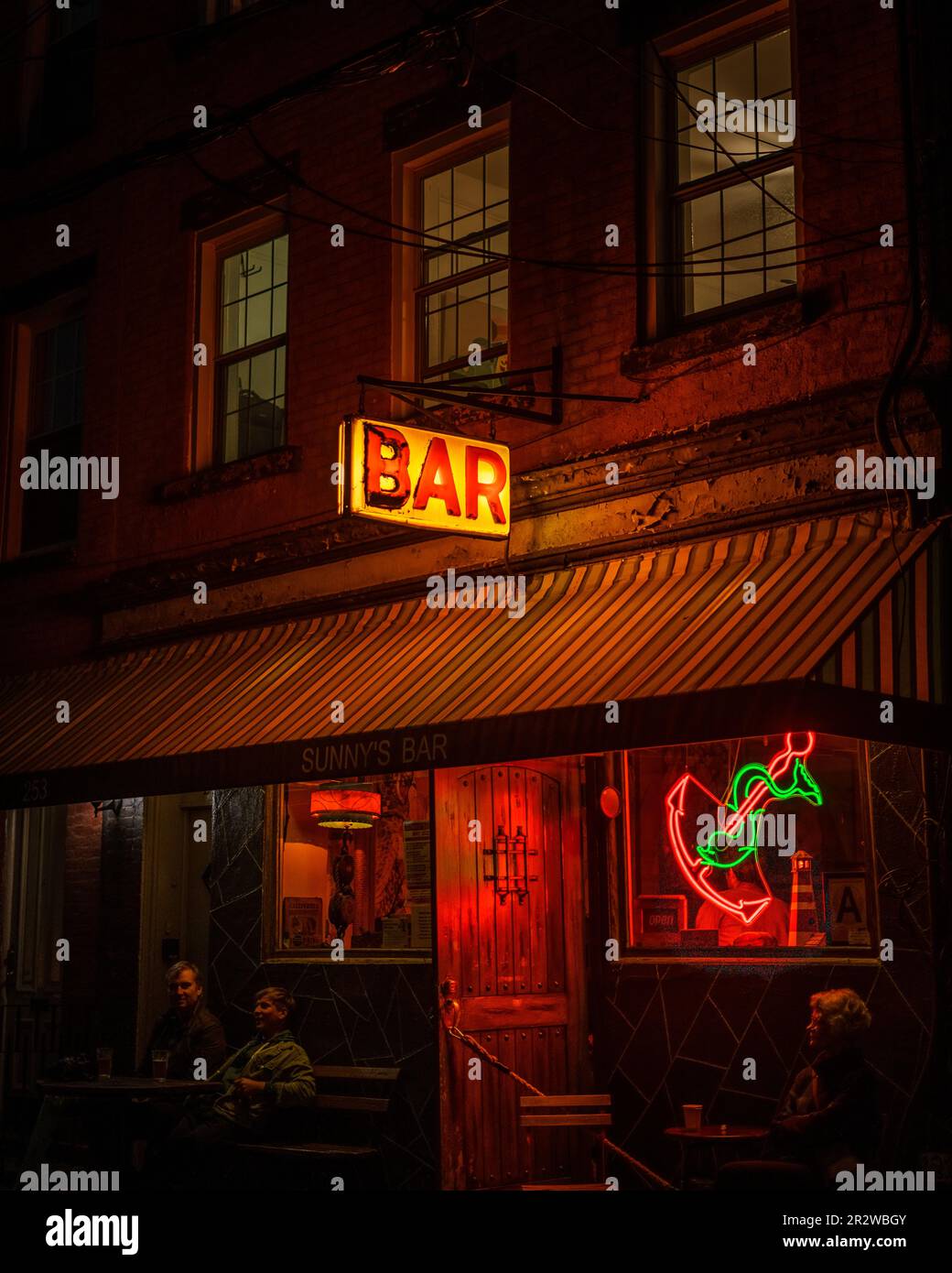 Sunnys Bar vintage sign at night in Red Hook, Brooklyn, New York Stock Photo