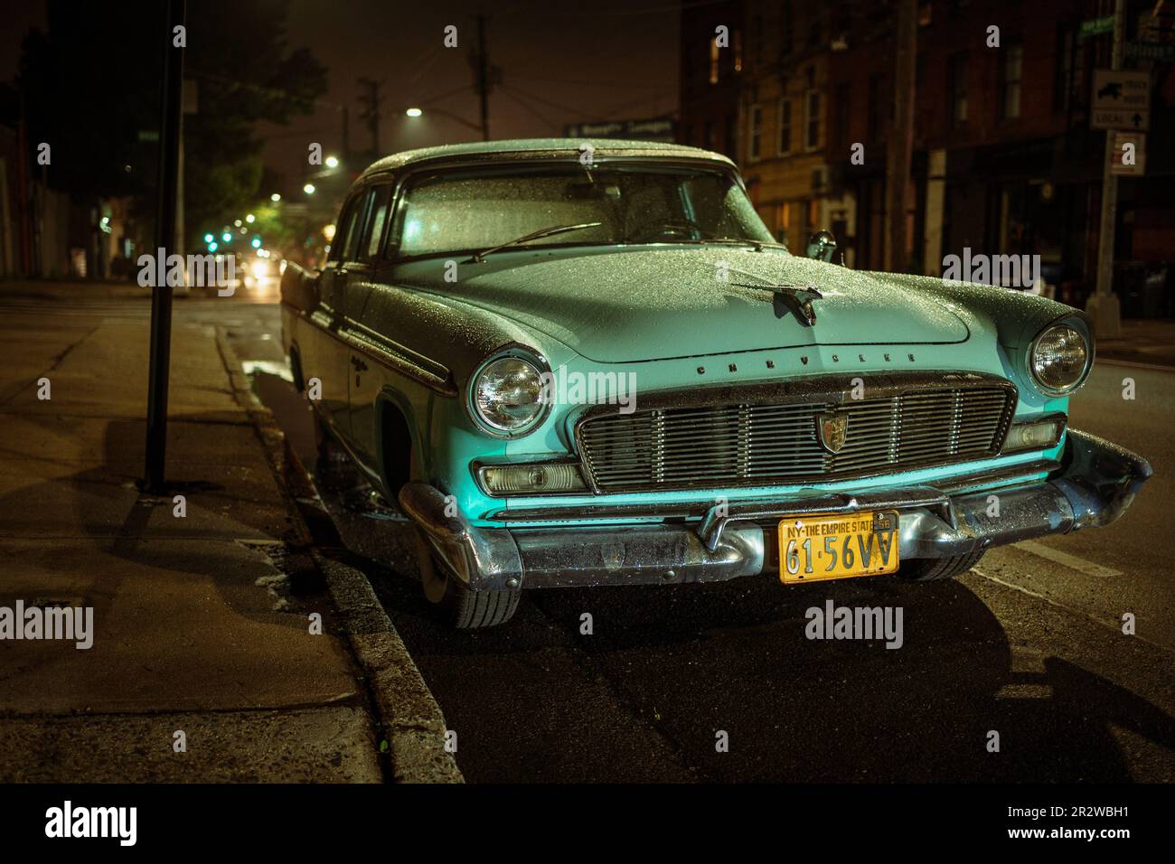 Vintage Chrysler car at night in Red Hook, Brooklyn, New York Stock Photo