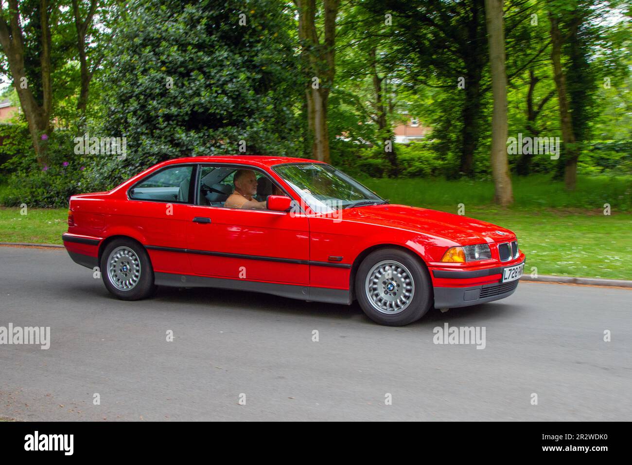 1994 90s nineties Red BMW 3 Series 318IS CPE 1796cc 5 speed manual; at the Lytham St Annes Classic & Performance Motor vehicle show displays of classic cars, UK Stock Photo