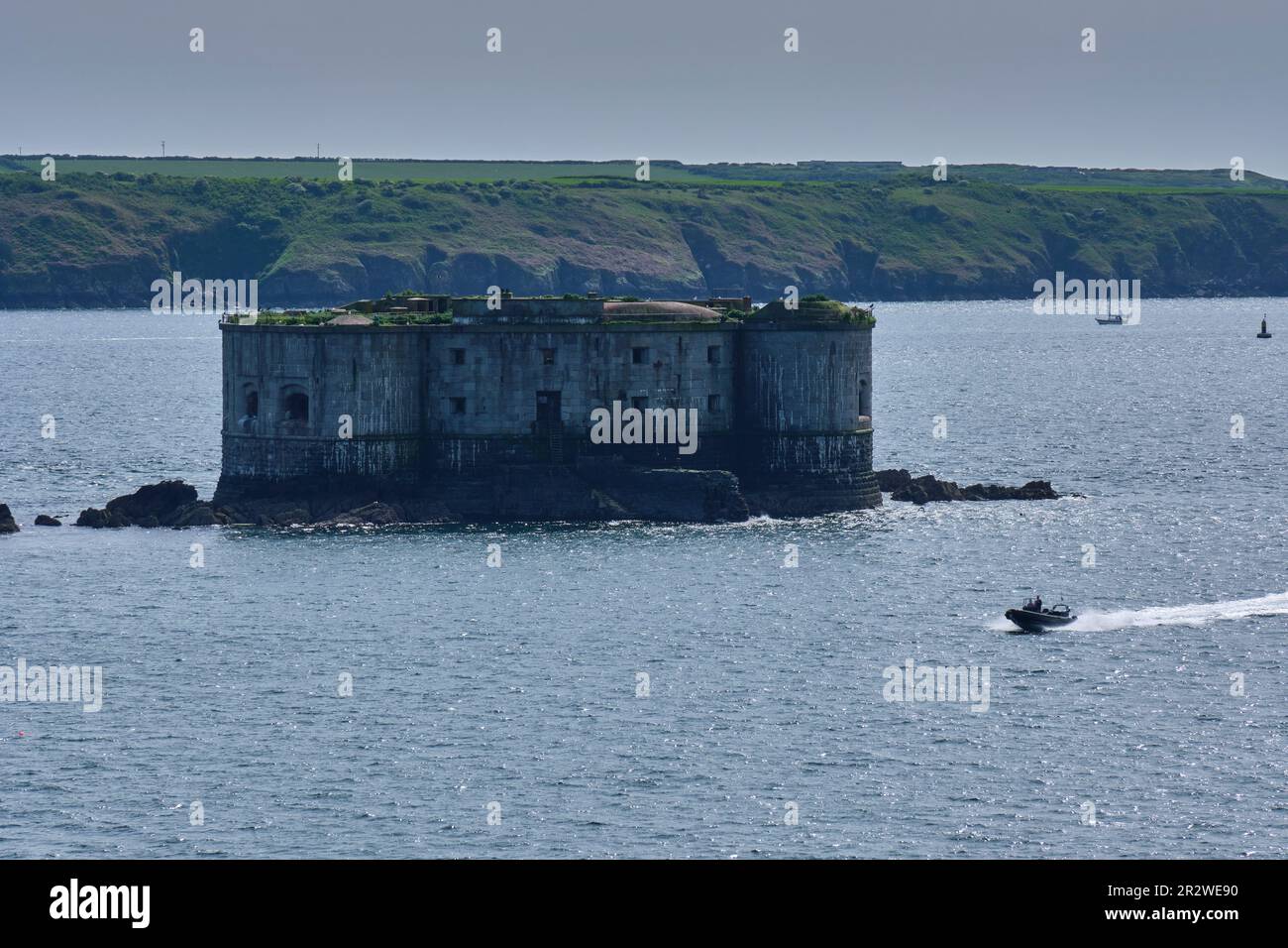 Speedboat passing Stack Rock seen from the Pembrokeshire Coast Path ...