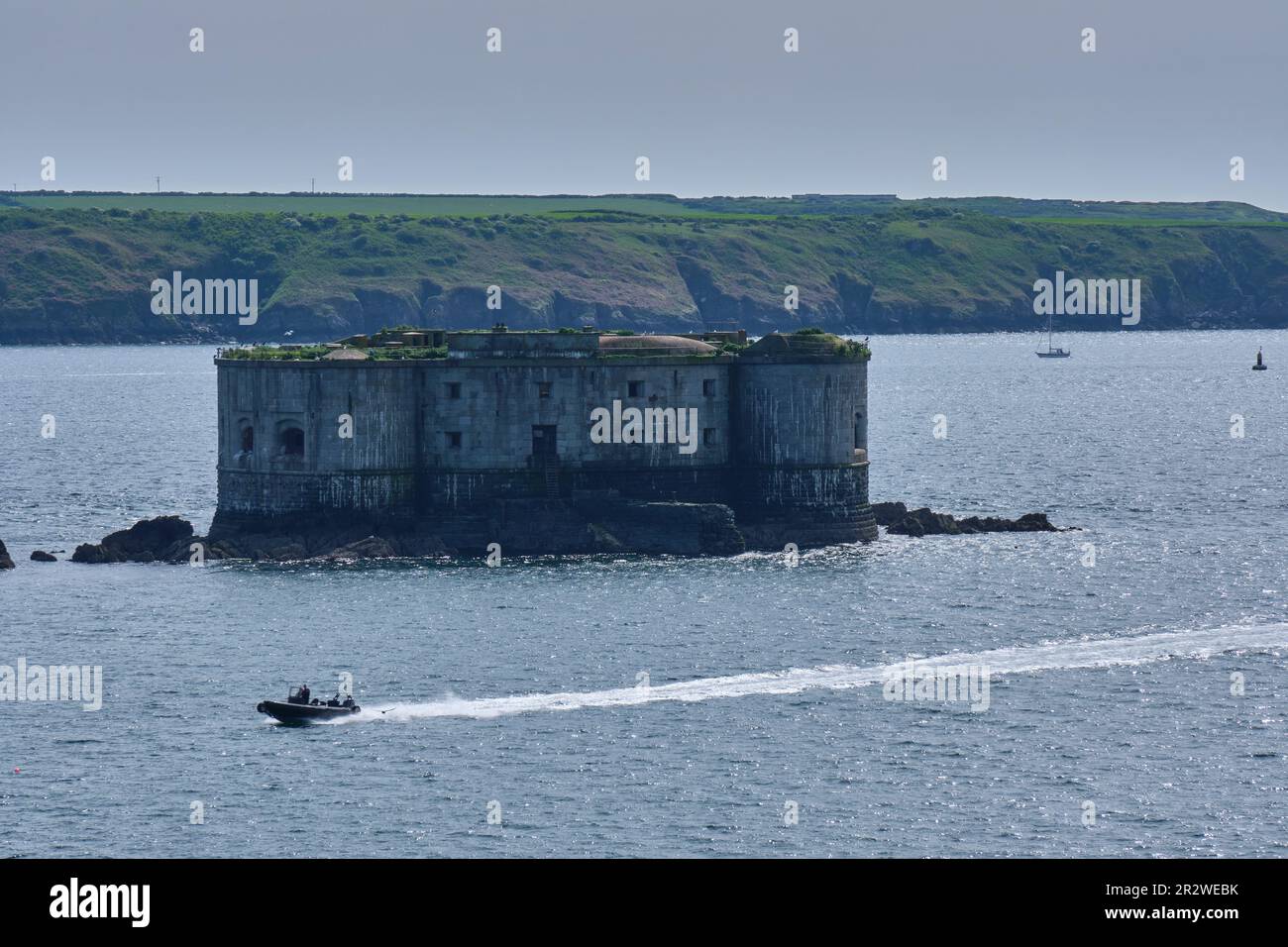Speedboat passing Stack Rock seen from the Pembrokeshire Coast Path ...