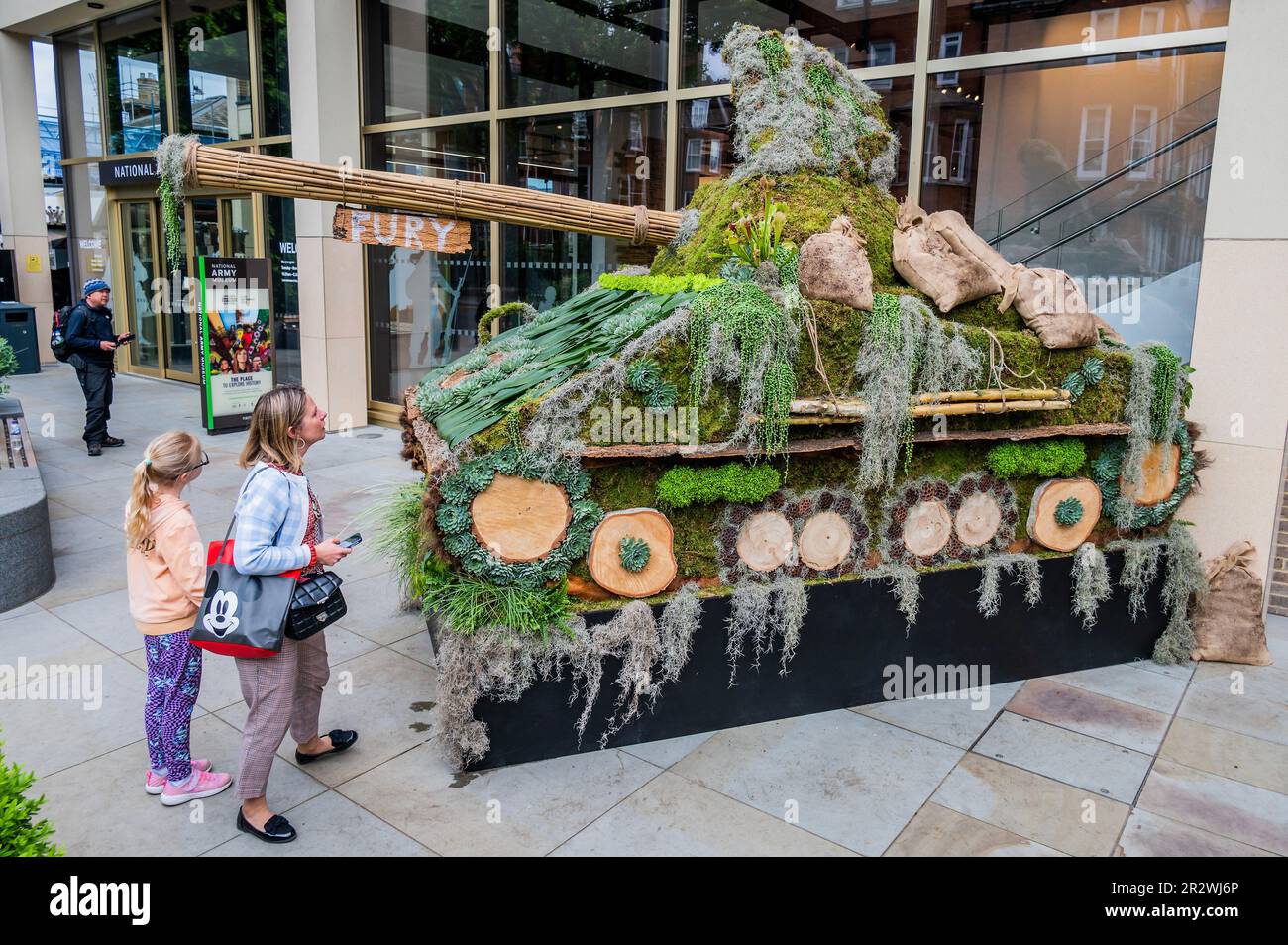 London, UK. 21st May, 2023. As part of Chelsea in Bloom a Sherman tanks made out of moss and other plants arrives outside the National Army Museum. The tank based on the one in the film Fury is just down the road from the Royal Hospital Chelsea, the current home of the Chelsea Flower Show. Credit: Guy Bell/Alamy Live News Stock Photo