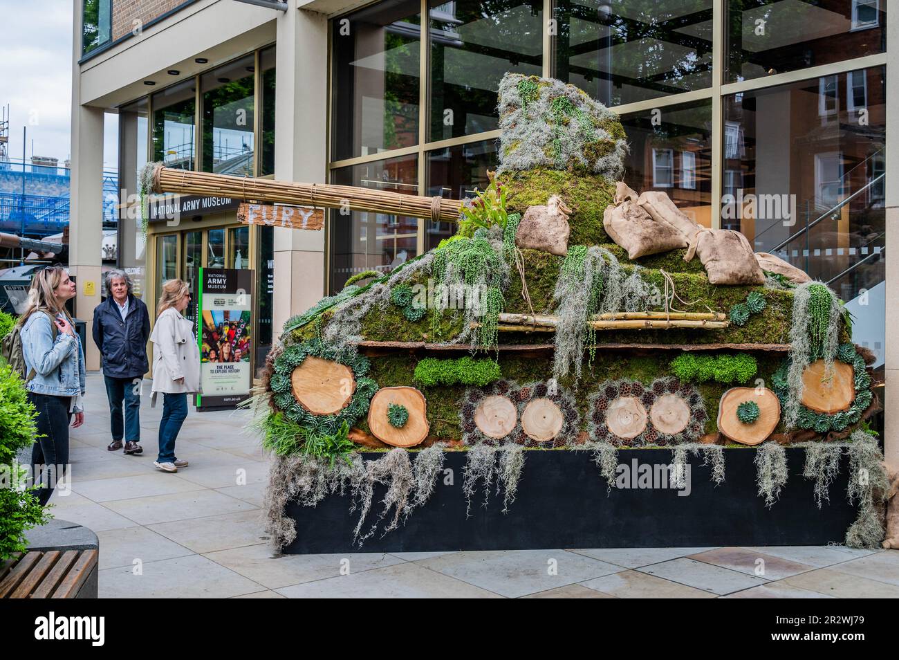 London, UK. 21st May, 2023. As part of Chelsea in Bloom a Sherman tanks made out of moss and other plants arrives outside the National Army Museum. The tank based on the one in the film Fury is just down the road from the Royal Hospital Chelsea, the current home of the Chelsea Flower Show. Credit: Guy Bell/Alamy Live News Stock Photo