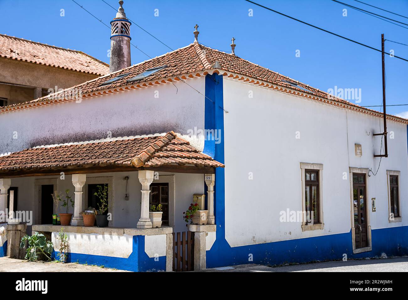 Typical house with blue borders in Portugal Stock Photo