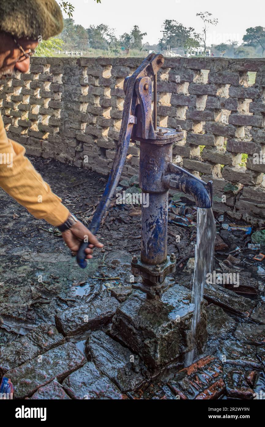 12 19 2014 Vintage Cast iron Hand Operated Water Pump in rural site of