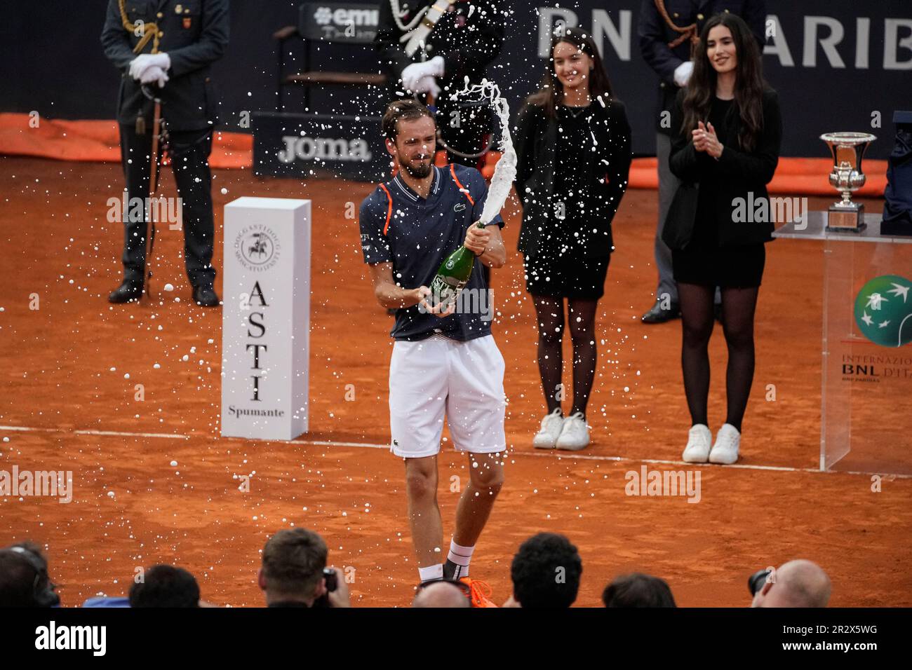 Daniil Medvedev of Russia sprays sparkling wine as he celebrates