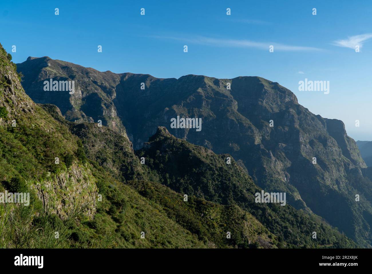 Mountain landscape. View of mountains on the route Queimadas Forestry Park - Caldeirao Verde. Madeira Island, Portugal, Europe. Stock Photo