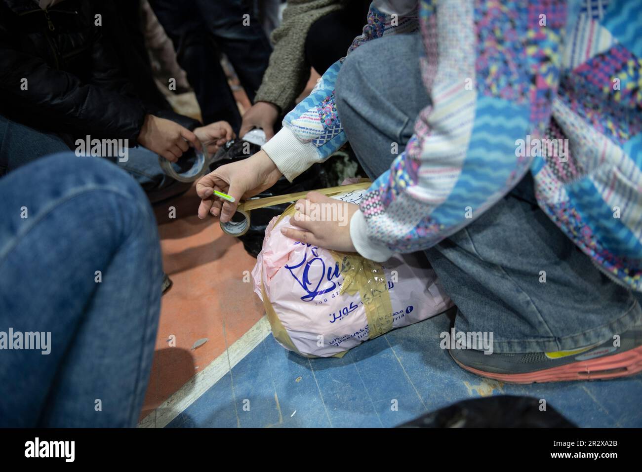 People in Damascus take the action and start collect stuff and aid to help people who affected by the earthquake Stock Photo