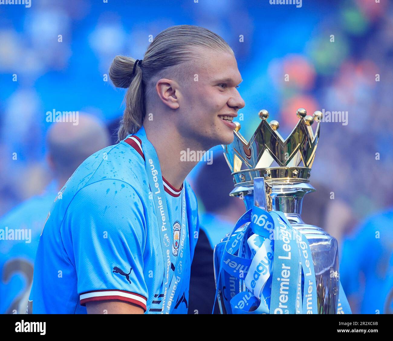 Erling Haaland #9 of Manchester City with the Premier League trophy 
