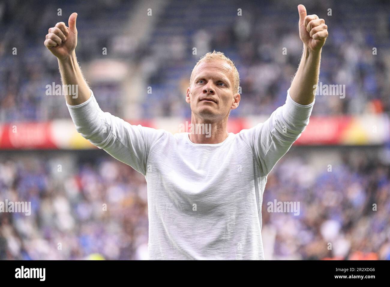 Genk, Belgium. 21st May, 2023. Union's head coach Karel Geraerts reacts with the supporters after a soccer match between KRC Genk and Royale Union Saint-Gilloise, Sunday 21 May 2023 in Genk, on day 4 of the Champions' play-offs of the 2022-2023 'Jupiler Pro League' first division of the Belgian championship. BELGA PHOTO LAURIE DIEFFEMBACQ Credit: Belga News Agency/Alamy Live News Stock Photo