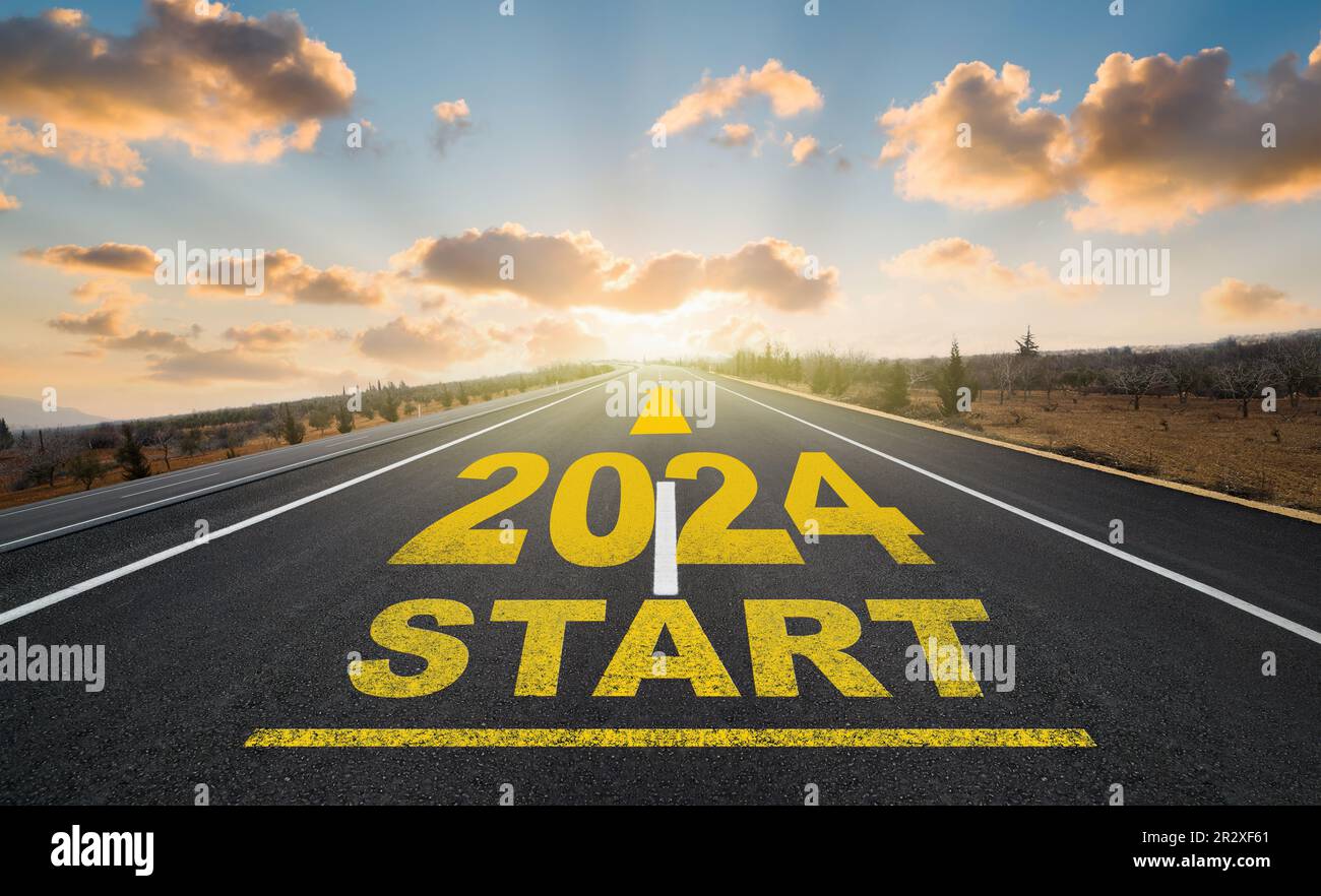 Entering the new year. Start plan for 2023. The year 2023 was written on the asphalt road at sunrise. Concept of business strategy Stock Photo